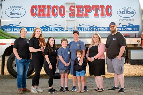employees in front of Chico Septic tank pumping truck